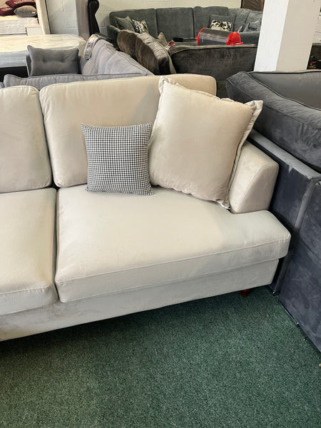 Sofa with chaise on the left in Plush Cream