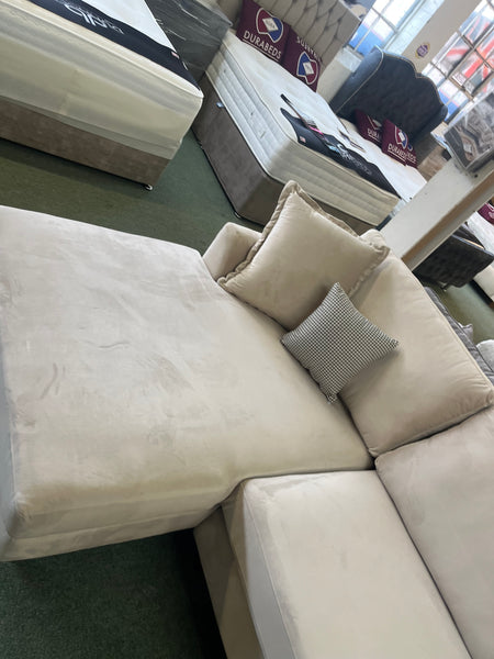 Sofa with chaise on the left in Plush Cream
