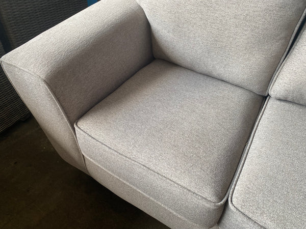 Small 2 seater grey fabric sofa