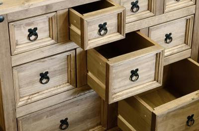 Corona 4+3+2 Drawer Merchants Chest in Distressed Waxed Pine.